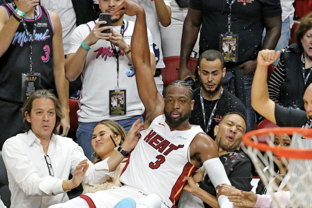 Dwyane Wade Falls Into Chrissy Teigen, The Memes Are Gold