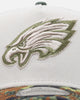 New Era Philadelphia Eagles "Camo Visor" 9FORTY A-Frame Trucker Snapback Stone/Olive