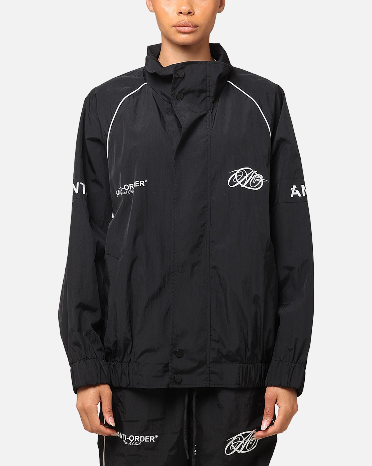 The Anti Order Track Club Windbreaker Jacket Black/Grey