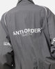 The Anti Order Track Club Windbreaker Jacket Dark Grey/Grey
