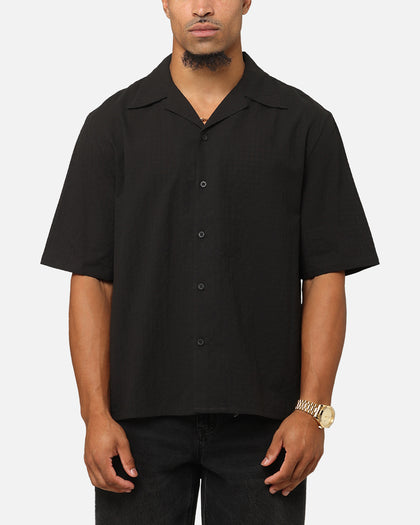 black short sleeve dress shirt Phenom Classic Stylish and Versatile Fit Guaranteed to be your new favorite shirt to wear by itself Quattro Flex Short Sleeve Button