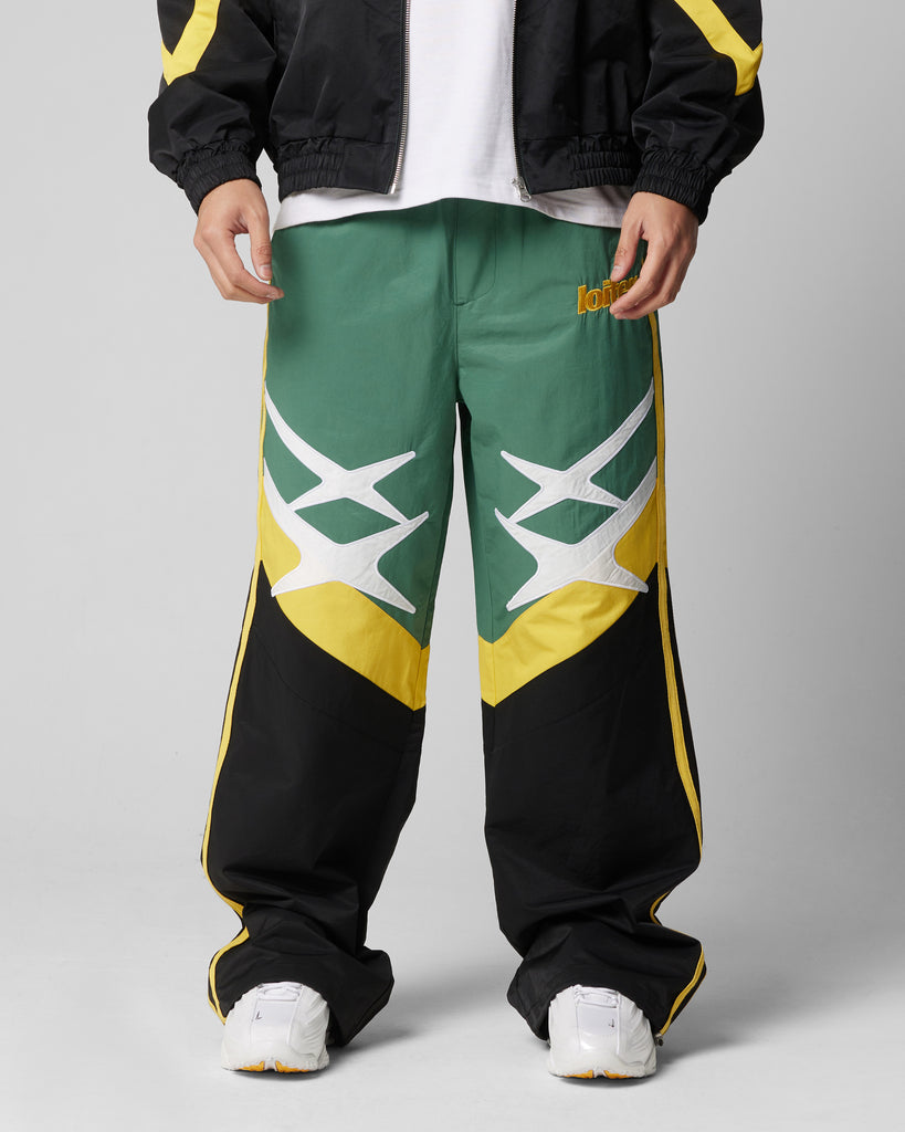 Loiter Hybrid Trackpants Green/Yellow | Culture Kings US