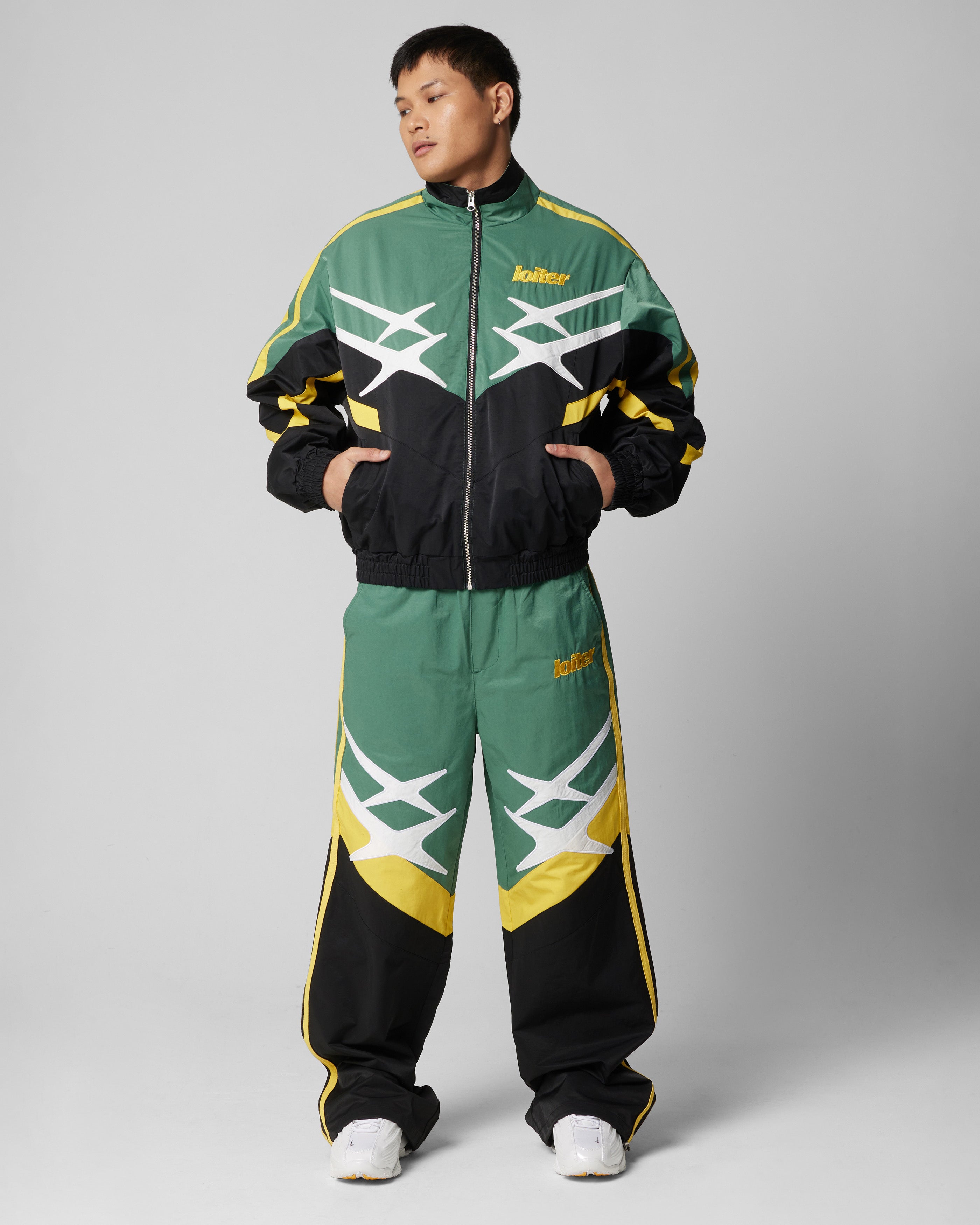 Loiter Hybrid Trackpants Green/Yellow | Culture Kings US