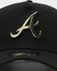 New Era Atlanta Braves 9FORTY A-Frame Metal Badge Snapback Black/Gold Metal