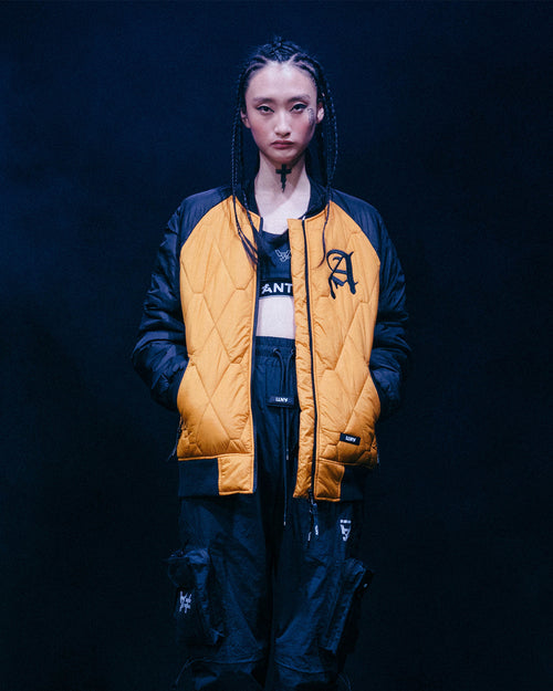 The Anti Order Corvus Quilted Bomber Jacket Mustard/Black/White