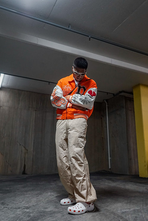Loiter Paradise Varsity Jacket Orange