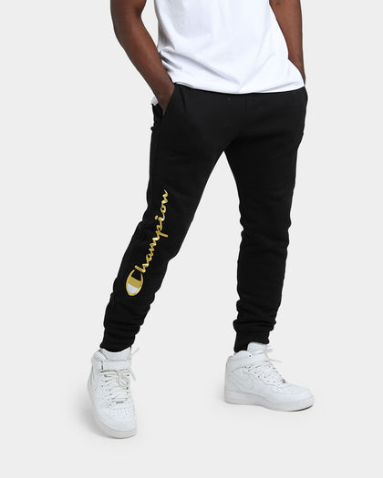 CHAMPION REV WEAVE SCRIPT JOGGER BLACK/GOLD
