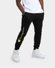 CHAMPION REV WEAVE SCRIPT JOGGER BLACK/GOLD