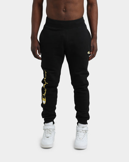 CHAMPION REV WEAVE SCRIPT JOGGER BLACK/GOLD