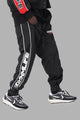 DXXMLife L-5 Nylxn Racing Trackpants Black