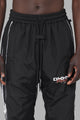 DXXMLife L-5 Nylxn Racing Trackpants Black