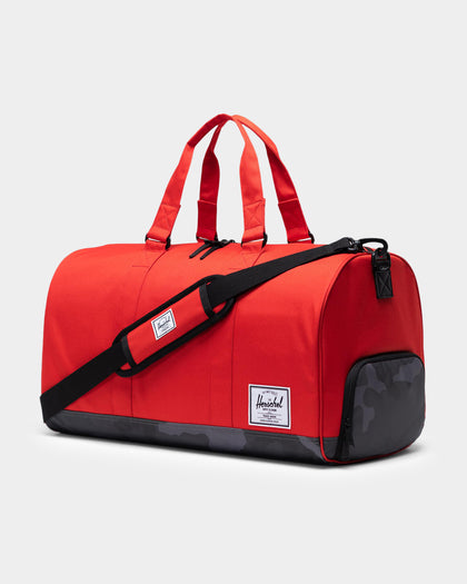 HERSCHEL BAG CO Novel Duffle Bag Red/Camo