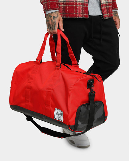 HERSCHEL BAG CO Novel Duffle Bag Red/Camo