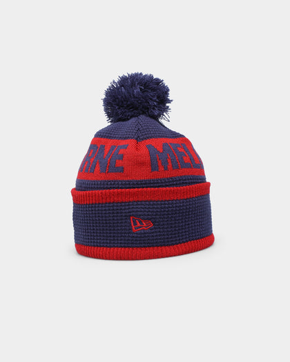 New Era Melbourne Demons AFL Opening Bounce 2022 Pom Waffle Wordmark Beanie Navy