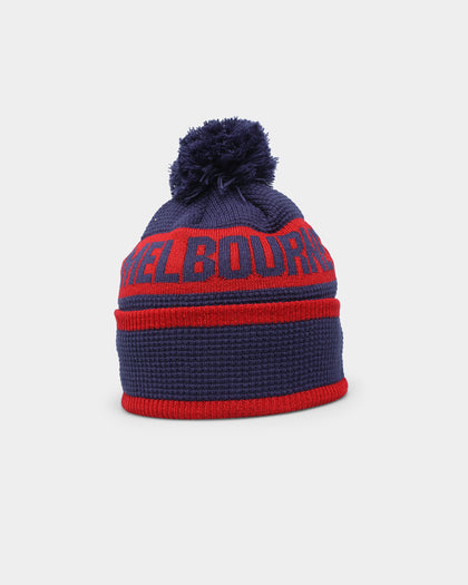 New Era Melbourne Demons AFL Opening Bounce 2022 Pom Waffle Wordmark Beanie Navy
