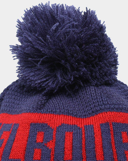 New Era Melbourne Demons AFL Opening Bounce 2022 Pom Waffle Wordmark Beanie Navy