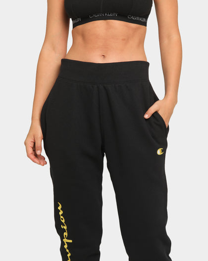 CHAMPION REV WEAVE SCRIPT JOGGER BLACK/GOLD