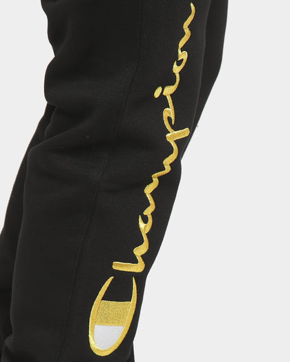 CHAMPION REV WEAVE SCRIPT JOGGER BLACK/GOLD